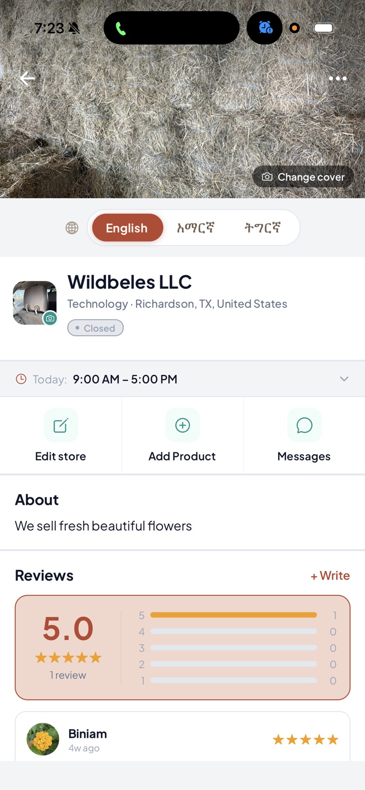 A Hamus business profile with reviews and an English, Amharic, and Tigrinya language toggle